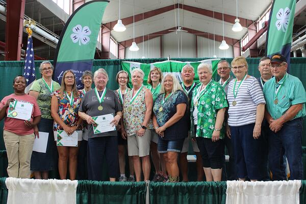 group of 4-H volunteers honored